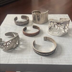 Set of Silver and Bronze Cuff Bracelets